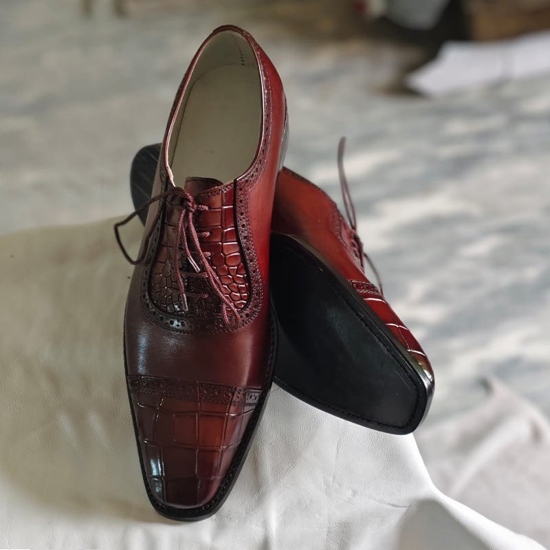 Handmade men’s burgundy crocodile embossed leather Oxford dress shoes with cap toe and lace-up design fornt toe & sole view