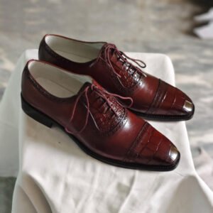 Handmade men’s burgundy crocodile embossed leather Oxford dress shoes with cap toe and lace-up design side view